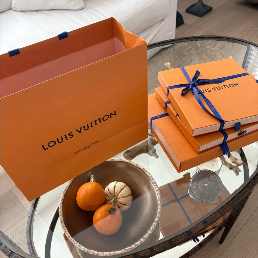 Selling Louis Vuitton bag and boxes with ribbon